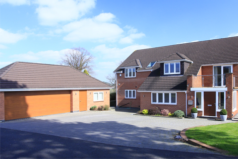 Extension to private residence with new, detached garage/gym block in Duffield, Derbyshire designed by Darren Mayner